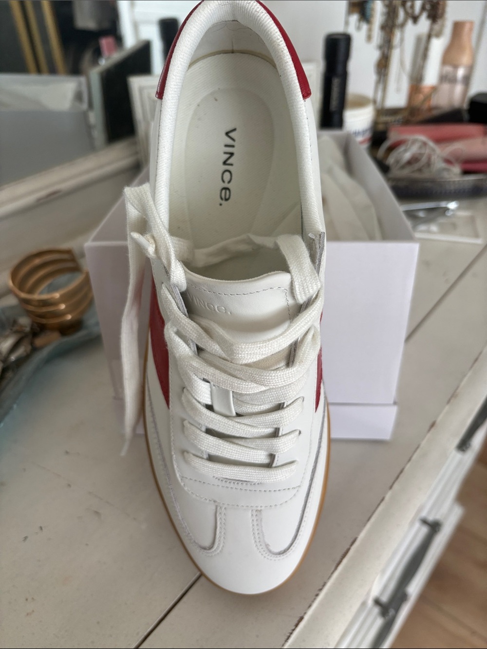 Vince Korrin White Sneaker with red stripe.